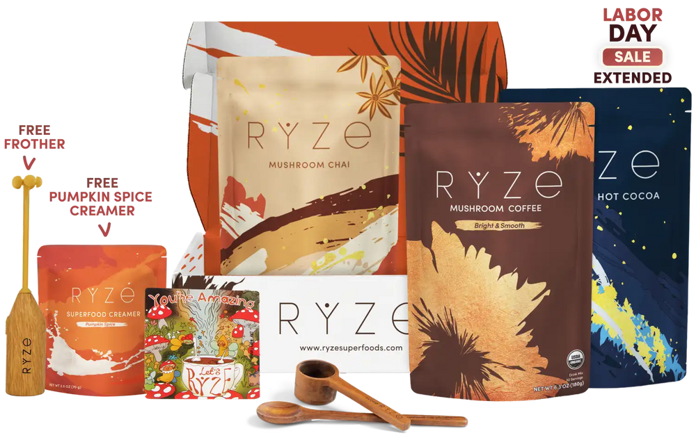 Ryzé Superfoods gift set featuring mushroom chai, mushroom coffee, hot cocoa, pumpkin spice creamer, and superfood creamer in branded pouches and boxes, with wooden measuring tools and a Labor Day Sale badge.